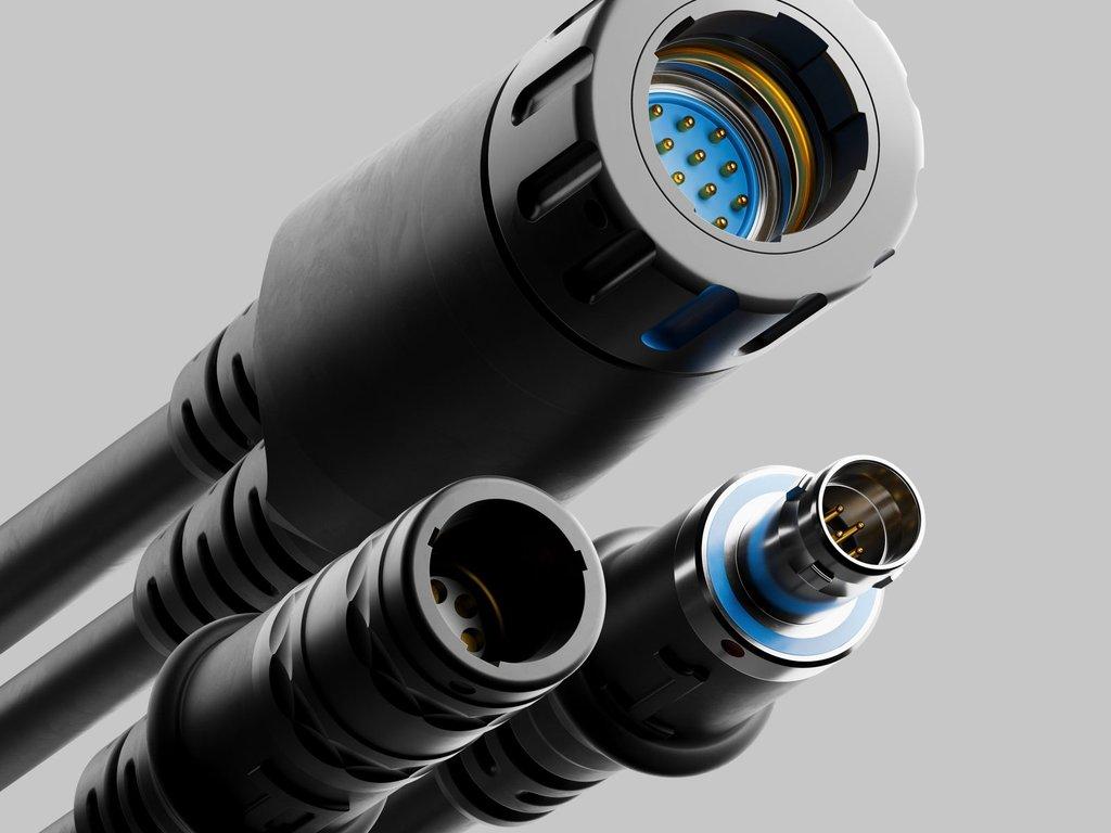 Close-up of PC-4532 Nemesis 19-pin receptacle, ODU 7-pin plug, and Nett Warrior receptacle